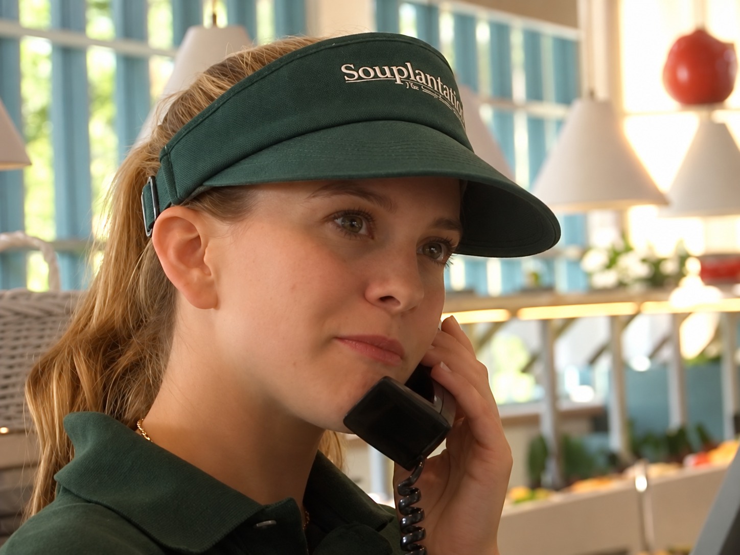 Souplantation employee speaking by phone during Studio 828 production